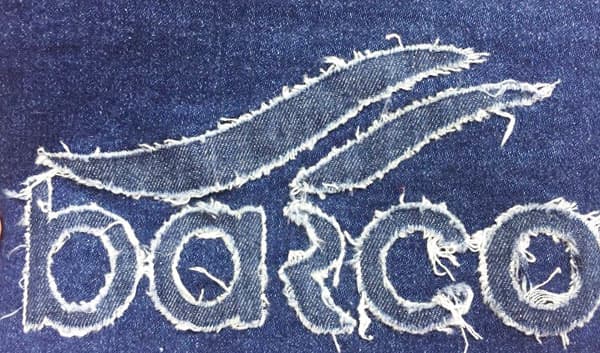 Text graphic decos on cotton jean