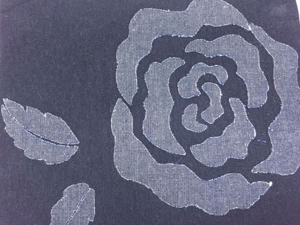 Graphic rose decos on cotton jean